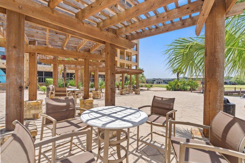 Set against the sparkling waters of Lake LBJ, this turn-key - photo 36