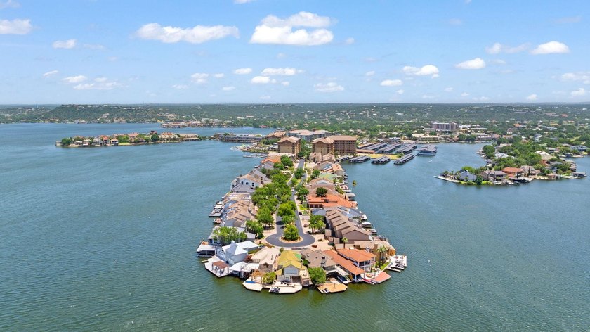Set against the sparkling waters of Lake LBJ, this turn-key - photo 42