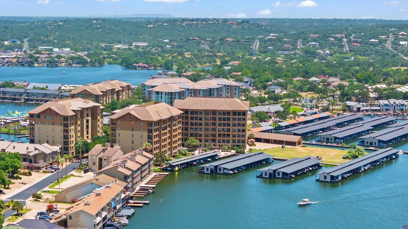 Set against the sparkling waters of Lake LBJ, this turn-key - photo 44