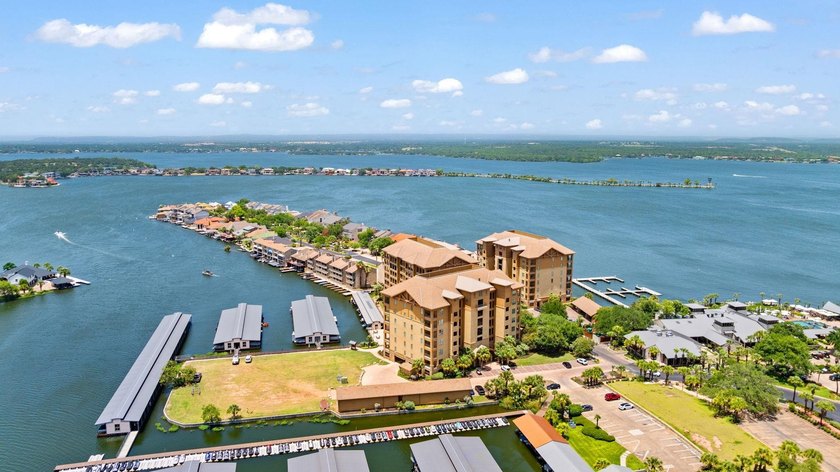 Set against the sparkling waters of Lake LBJ, this turn-key - photo 45