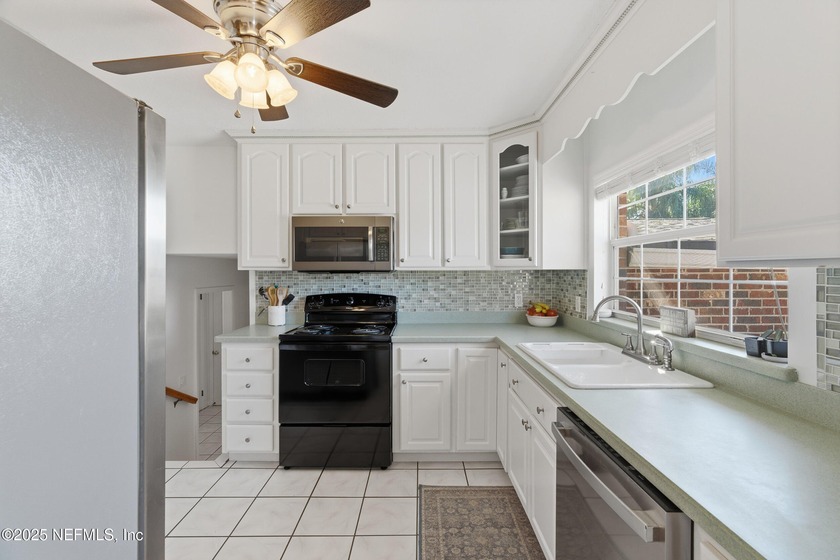 Experience waterfront living at its finest in this stunning - photo 11