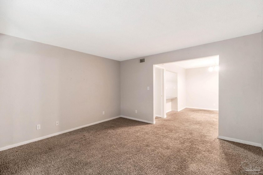 This 2 bedroom, 2 bath ground-floor condo offers an affordable - photo 5