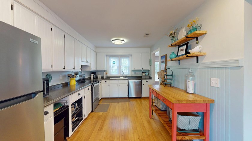Enjoy waterfront living in this charming lakefront property - photo 39