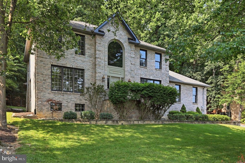 Welcome to this exceptional all-brick Colonial nestled on one of - photo 3