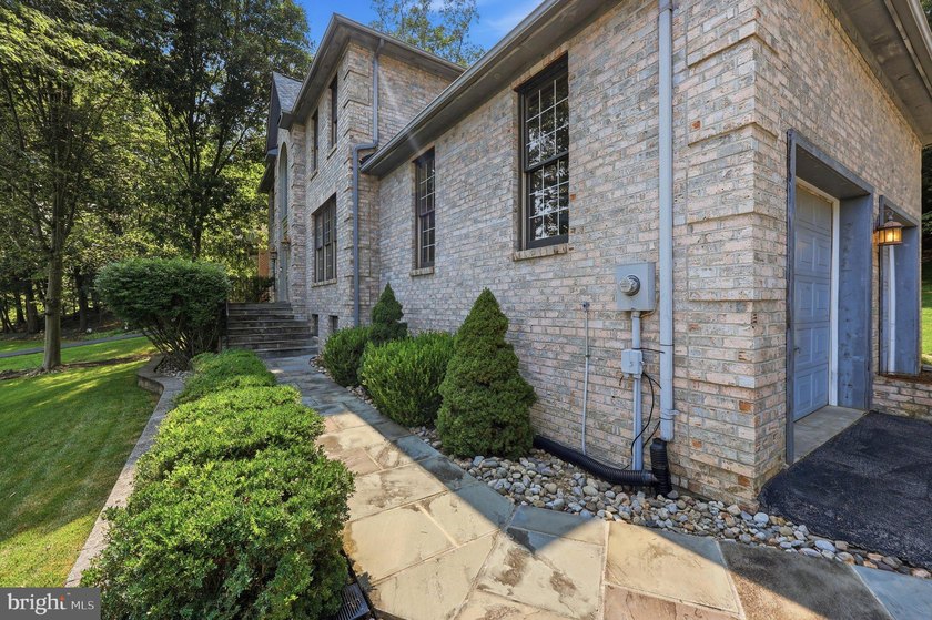 Welcome to this exceptional all-brick Colonial nestled on one of - photo 4