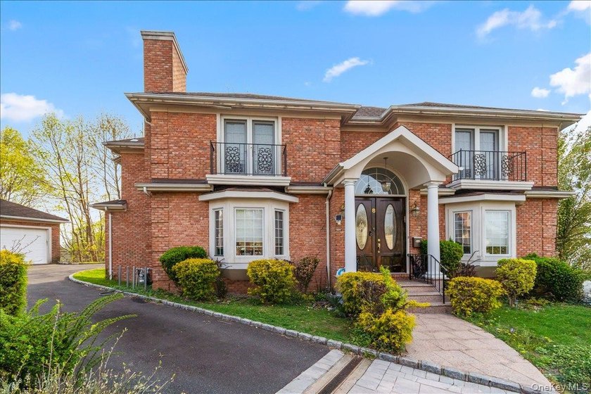This young Center Hall Brick Colonial offers a spacious and - photo 3
