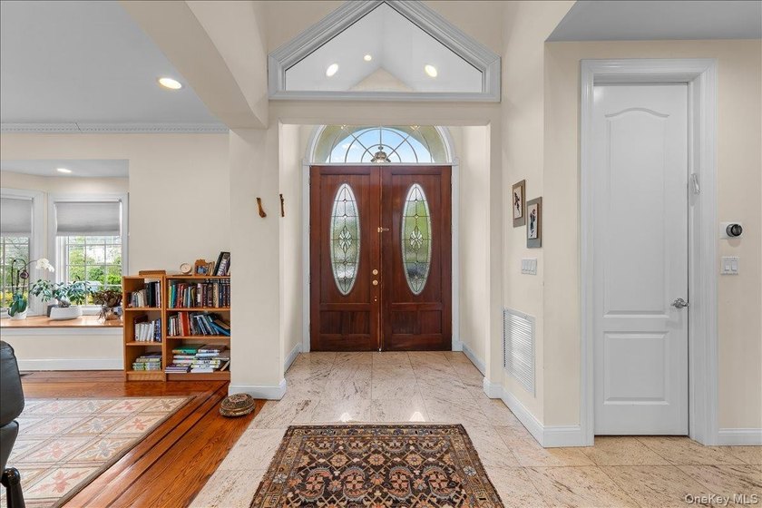 This young Center Hall Brick Colonial offers a spacious and - photo 5