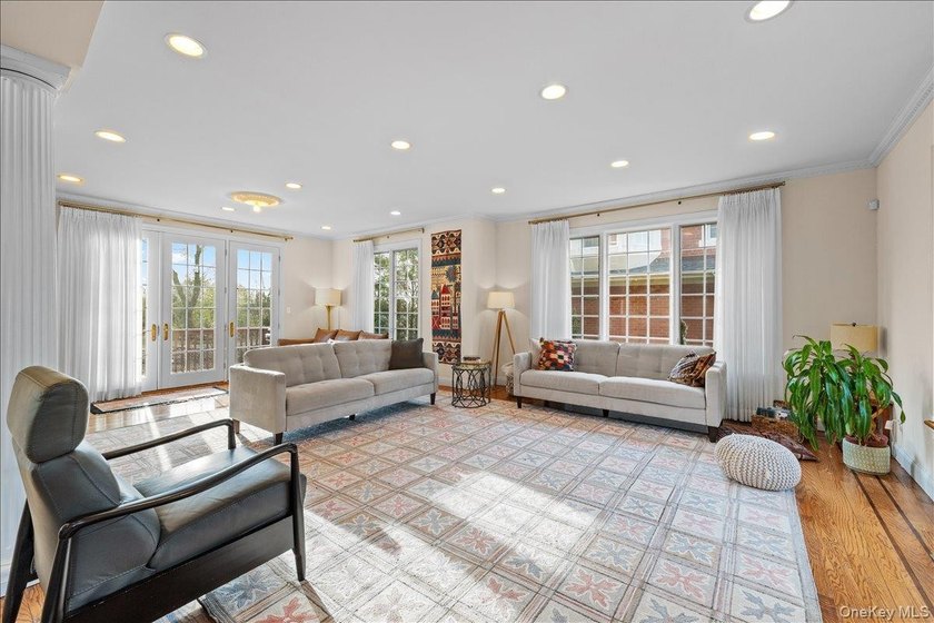 This young Center Hall Brick Colonial offers a spacious and - photo 6