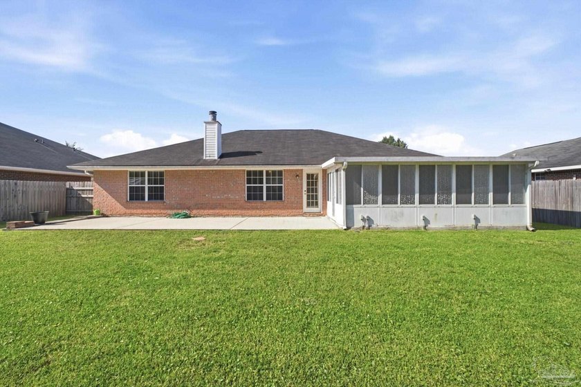 Welcome home to this 3 bedroom, 2 bathroom brick home nestled in - photo 3