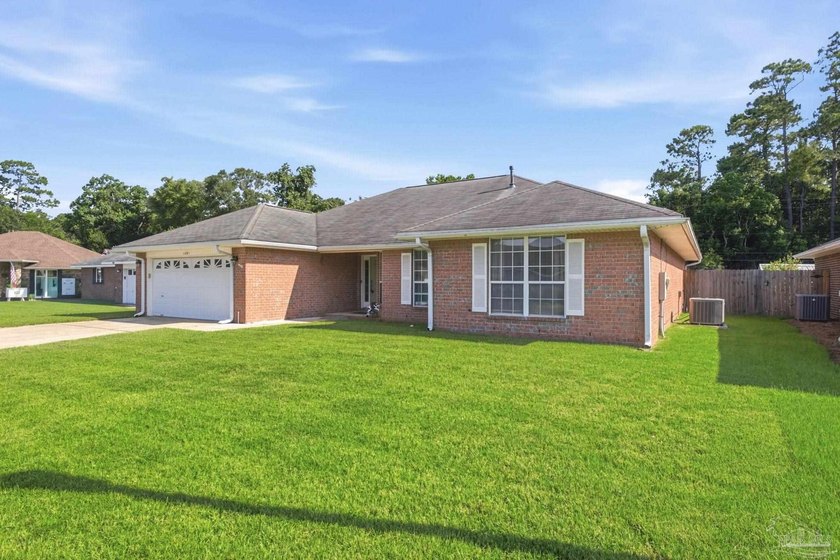 Welcome home to this 3 bedroom, 2 bathroom brick home nestled in - photo 4