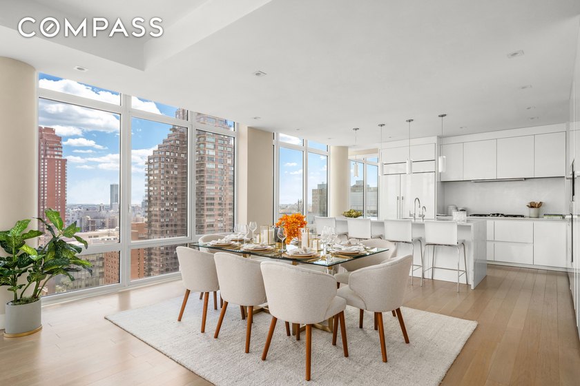Perched atop the 26th floor of The Charles Condominium, this - photo 5