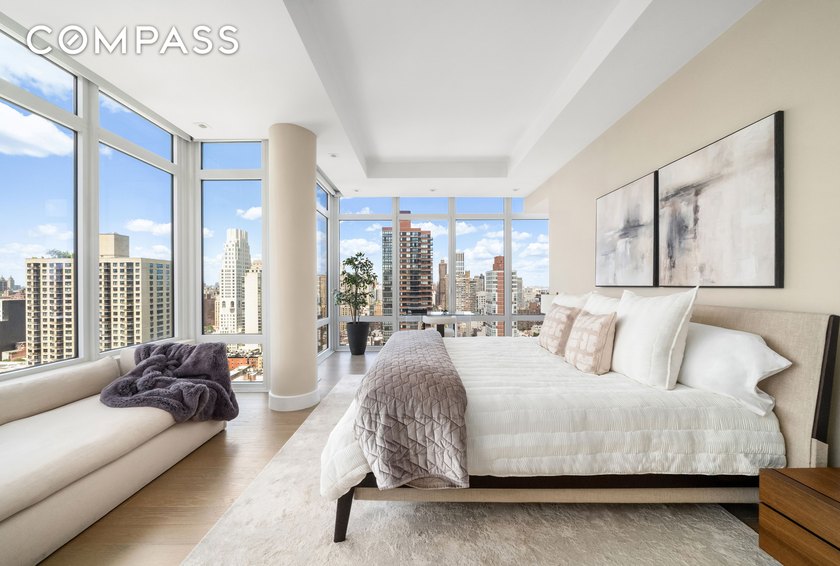 Perched atop the 26th floor of The Charles Condominium, this - photo 7