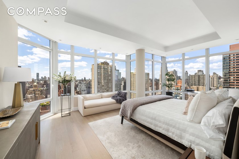 Perched atop the 26th floor of The Charles Condominium, this - photo 8