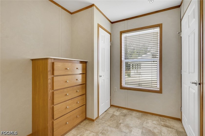 Situated on over half an acre, this pristine three-bedroom - photo 11