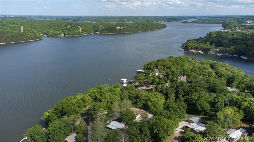Enjoy over 200 feet of lakefront with deep water, expansive main - photo 12