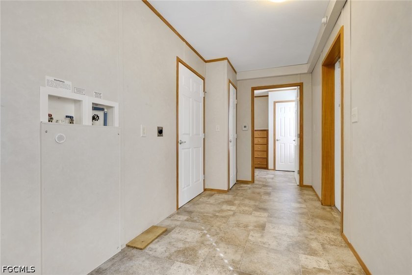Situated on over half an acre, this pristine three-bedroom - photo 12