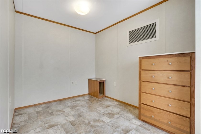 Situated on over half an acre, this pristine three-bedroom - photo 15