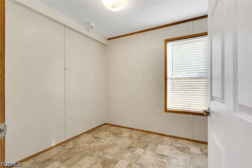 Situated on over half an acre, this pristine three-bedroom - photo 17