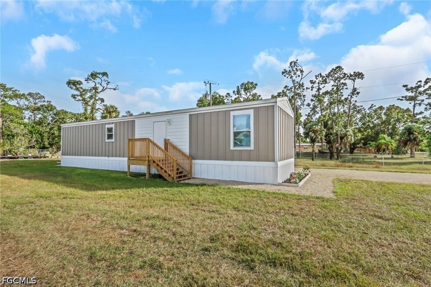 Situated on over half an acre, this pristine three-bedroom - photo 20