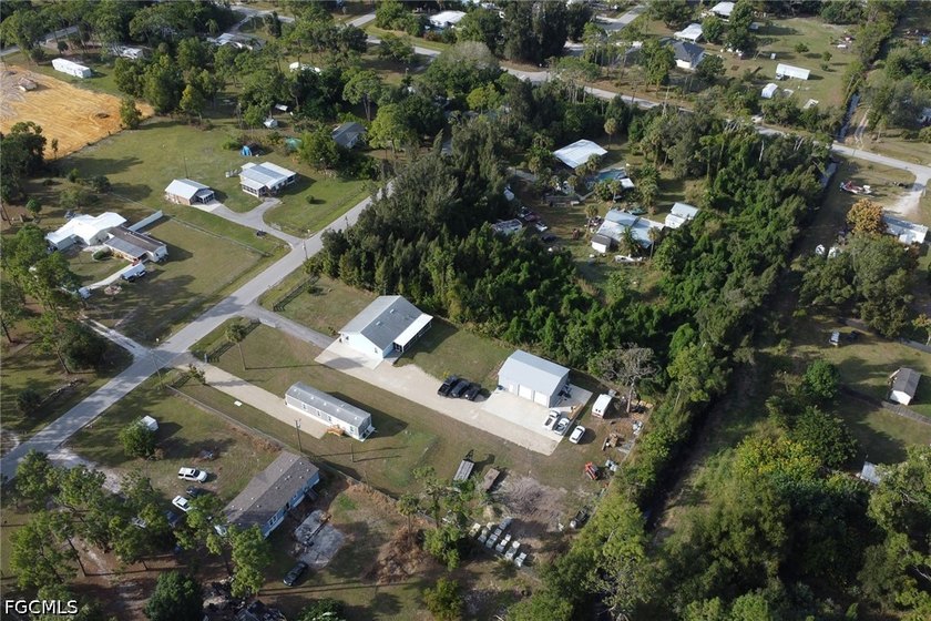Situated on over half an acre, this pristine three-bedroom - photo 22