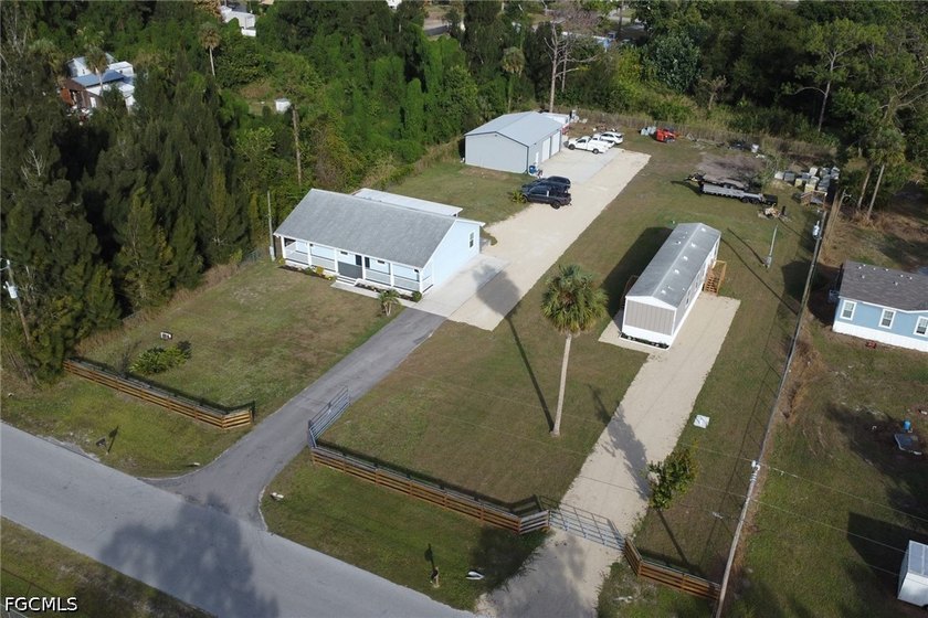 Situated on over half an acre, this pristine three-bedroom - photo 23