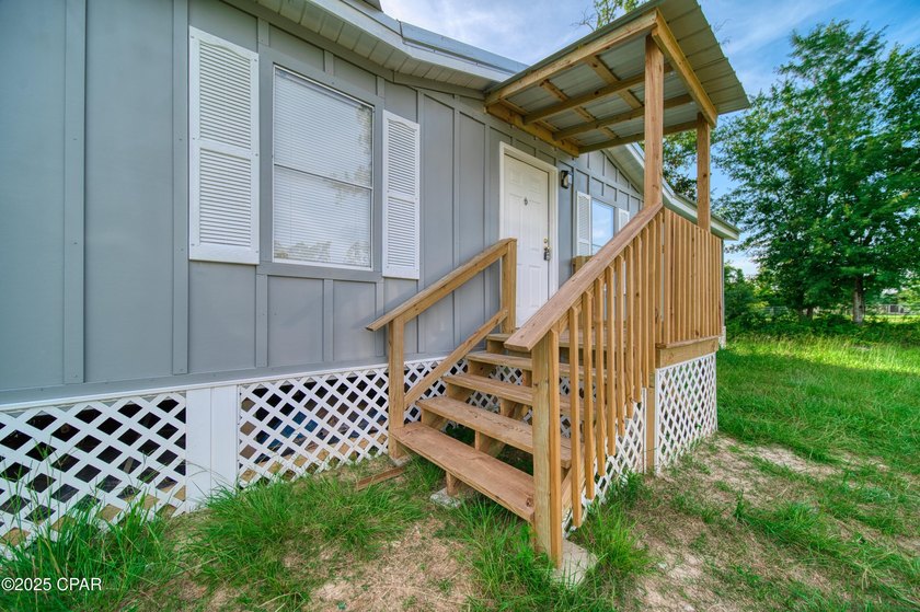 This beautifully renovated 3-bedroom, 2-bathroom home is packed - photo 3