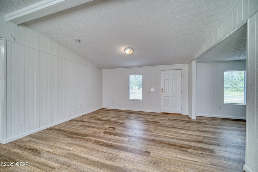 This beautifully renovated 3-bedroom, 2-bathroom home is packed - photo 5