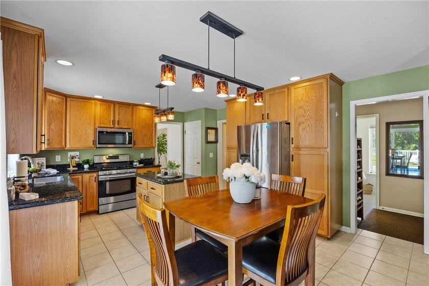 Price Improvement! Welcome to this beautiful 4-bedroom, 2.5-bath - photo 9