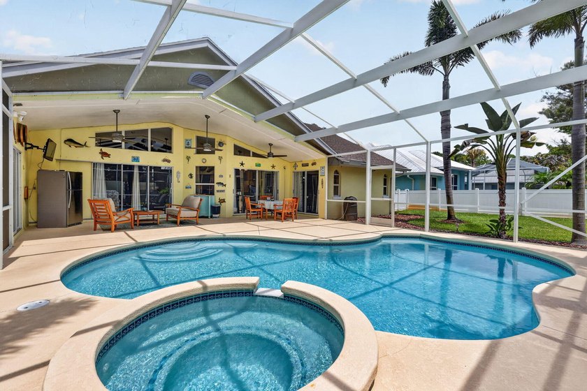 Palm trees sway over your private, screened pool at this move-in - photo 29