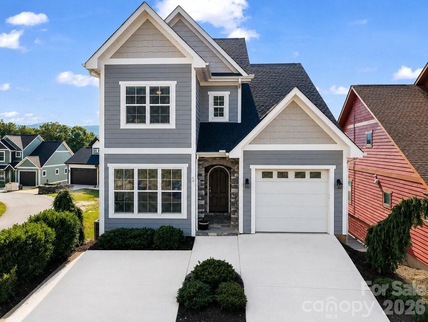 Experience the pinnacle of mountain living in this stunning - photo 4