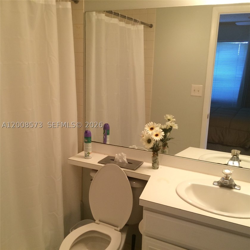 First-floor condo located in a gated golf community with a 24H - photo 11