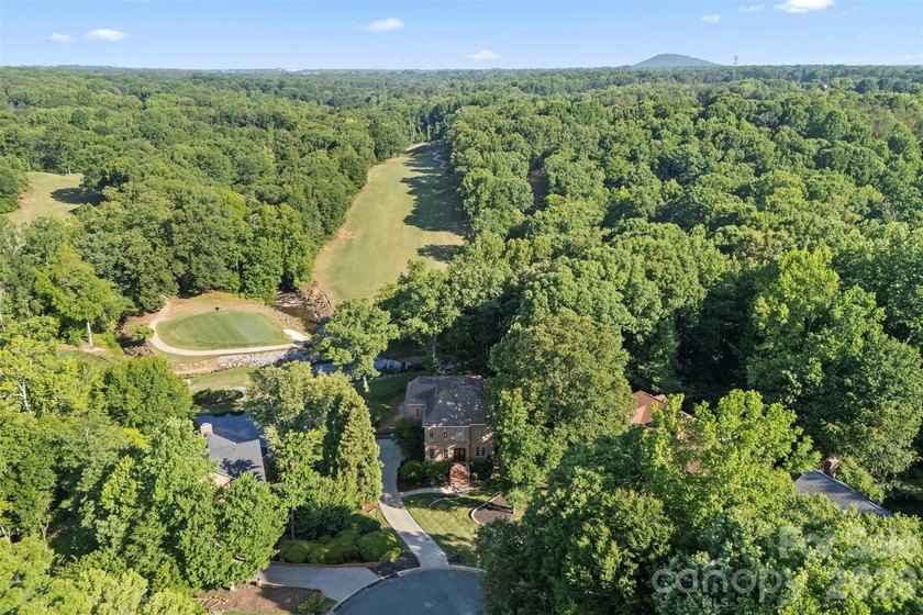 Located in the highly sought-after gated community of Cramer - photo 4