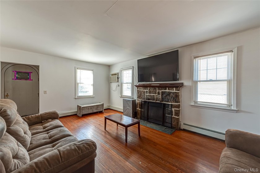 Welcome to this spacious four-bedroom, two-bath home nestled in - photo 3