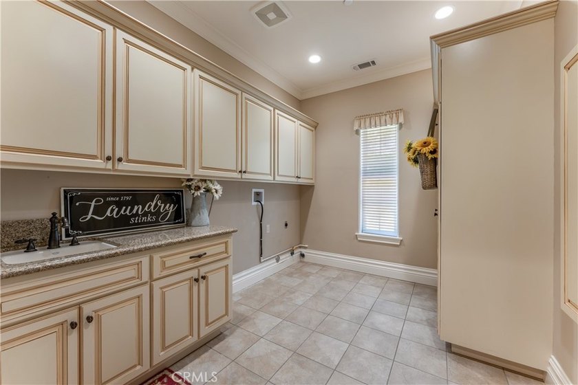 Welcome to 22121 Lynx Court, a custom-built single-story estate - photo 30
