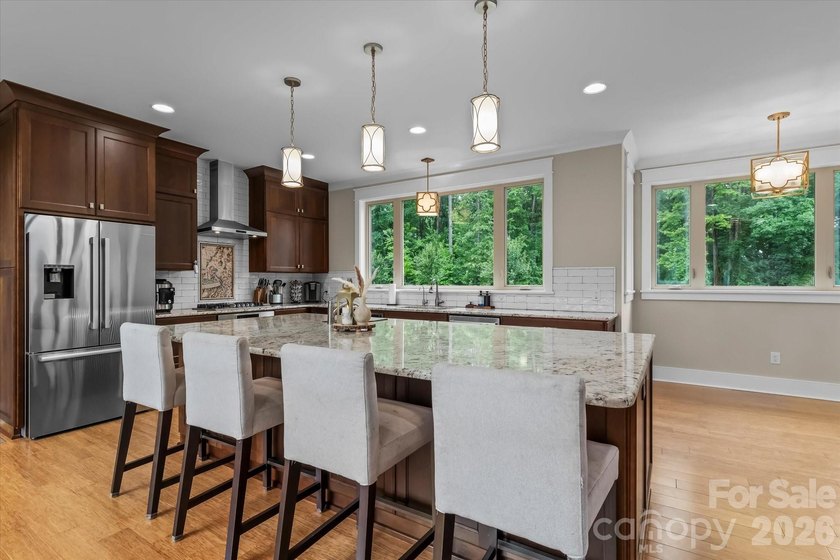 This exceptional custom-built luxury home, originally crafted as - photo 8
