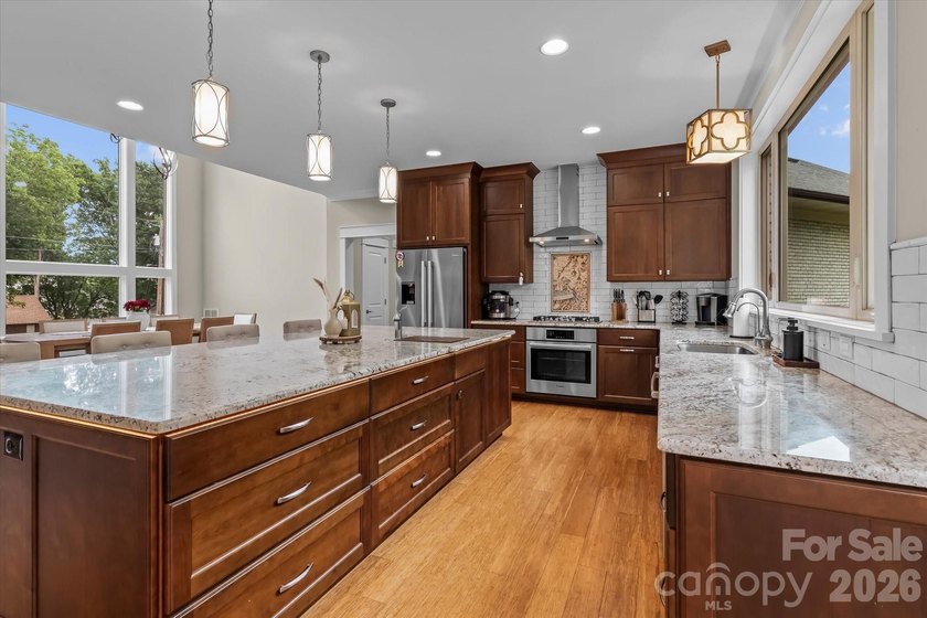 This exceptional custom-built luxury home, originally crafted as - photo 9