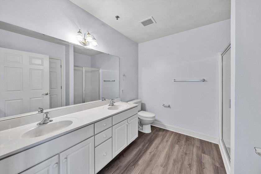 Condo living at its best. This 2 bedroom, 2 bath unit is light - photo 23