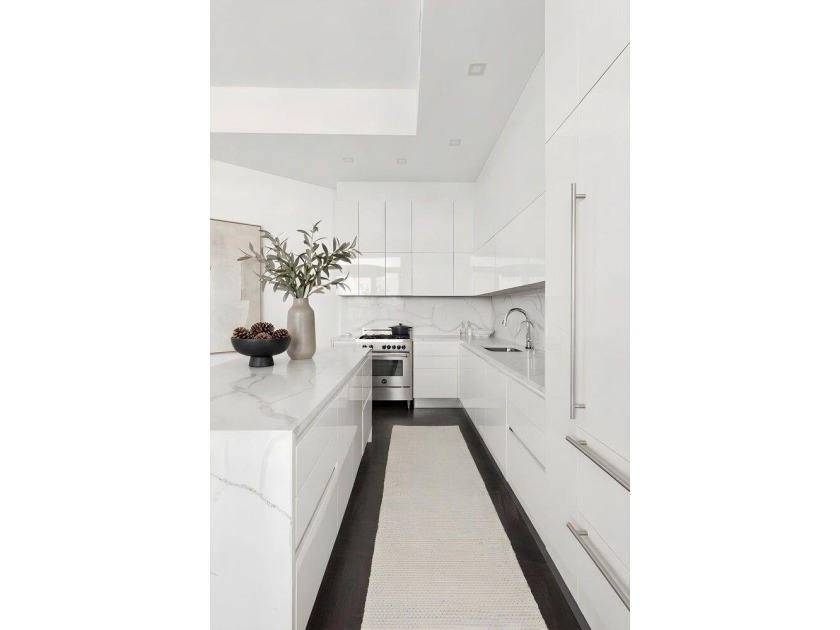Residence 6E at 88 Withers Street is a stunning , design-forward - photo 2