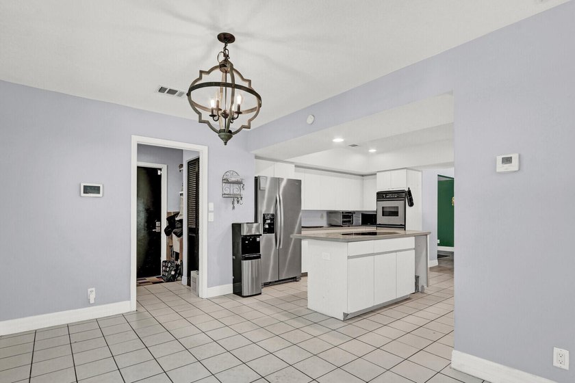 New Listing! Well-maintained 3-bedroom, 2-bath home on over an - photo 11