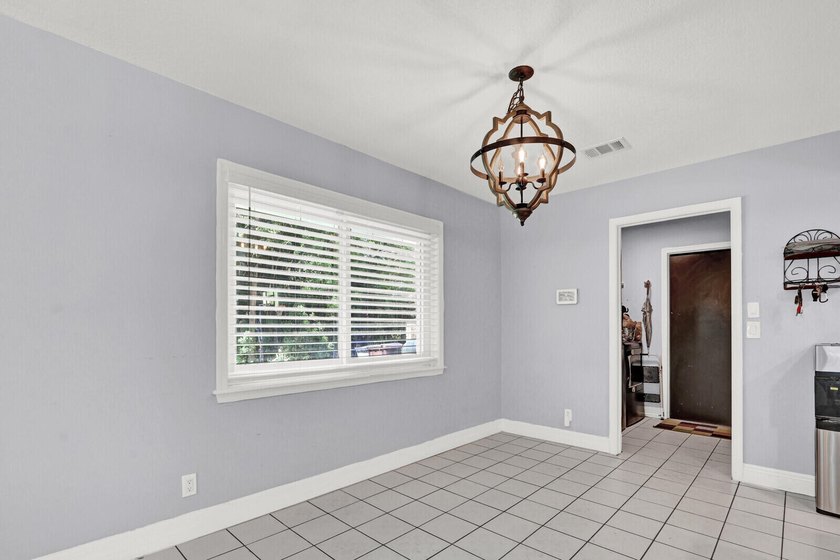 New Listing! Well-maintained 3-bedroom, 2-bath home on over an - photo 12
