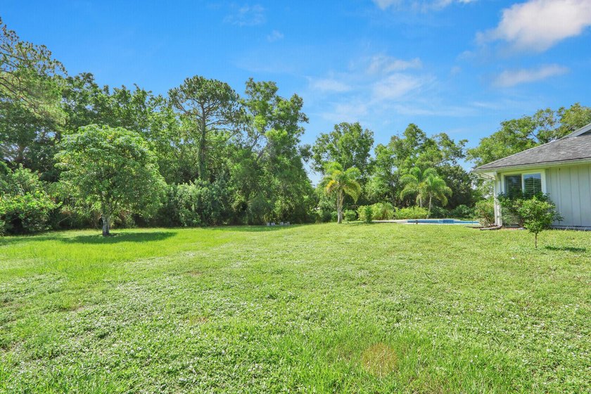 New Listing! Well-maintained 3-bedroom, 2-bath home on over an - photo 34