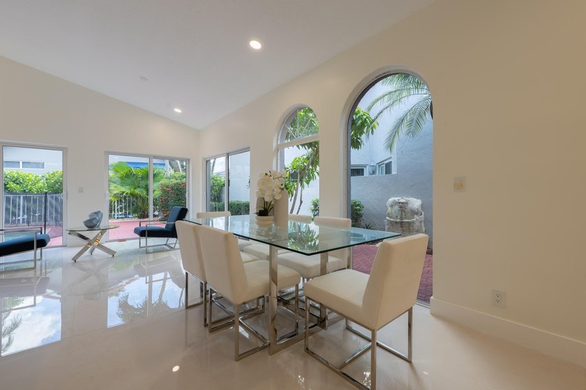 Welcome to this 3/2 house in the central-Boca neighborhood of - photo 16