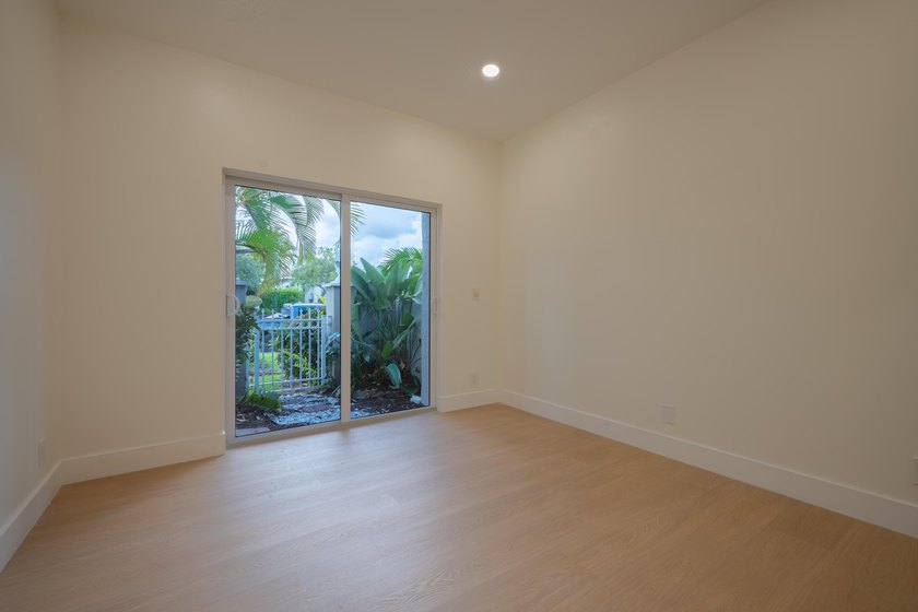 Welcome to this 3/2 house in the central-Boca neighborhood of - photo 34
