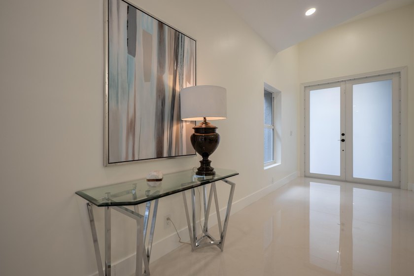 Welcome to this 3/2 house in the central-Boca neighborhood of - photo 39