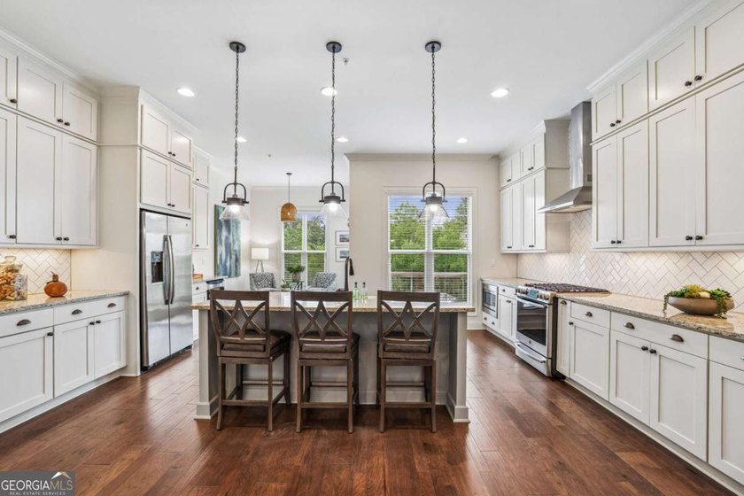 THE BEST LOCATION IN WALKABLE DOWNTOWN ALPHARETTA. Nestled - photo 14