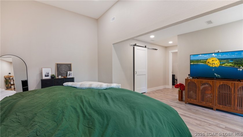 This rare lakefront villa-esque condo is one of only 2 units in - photo 21