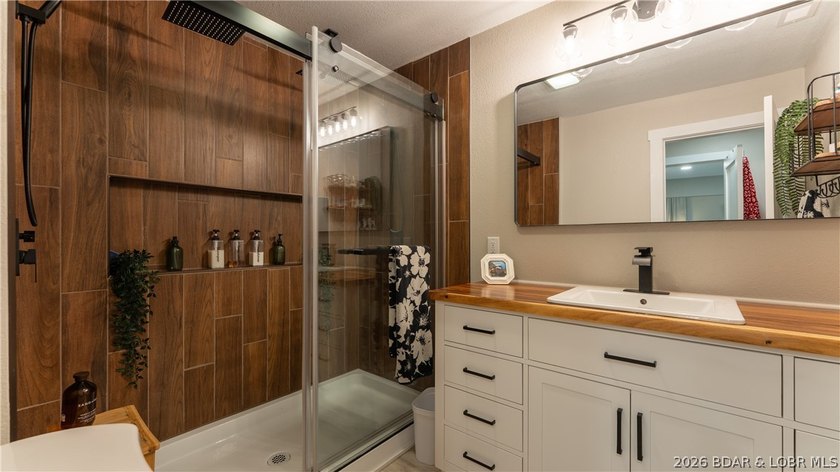 This rare lakefront villa-esque condo is one of only 2 units in - photo 23