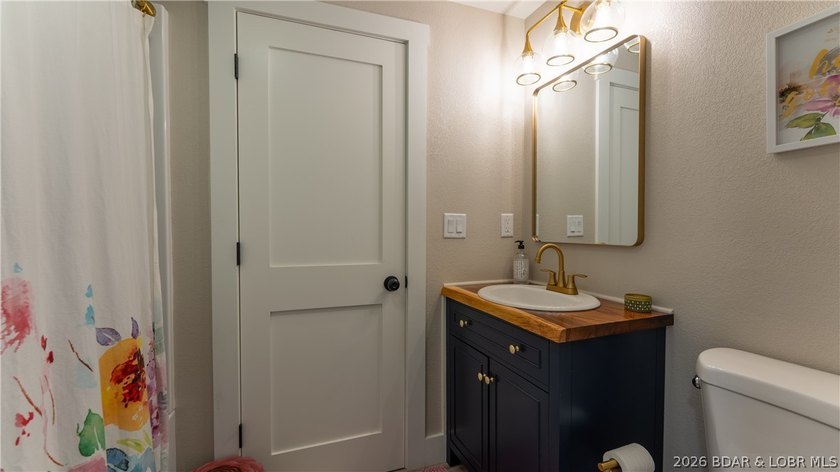 This rare lakefront villa-esque condo is one of only 2 units in - photo 25
