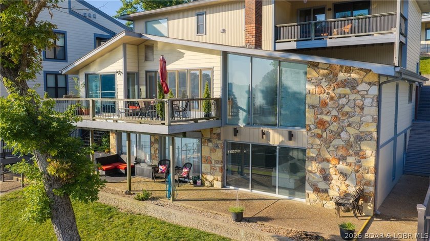 This rare lakefront villa-esque condo is one of only 2 units in - photo 37