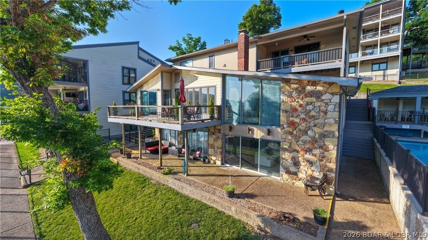 This rare lakefront villa-esque condo is one of only 2 units in - photo 38